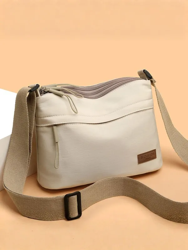 Beige_Lightweight_Nylon_Crossbody_Bag_with_Multi-Pocket_Design