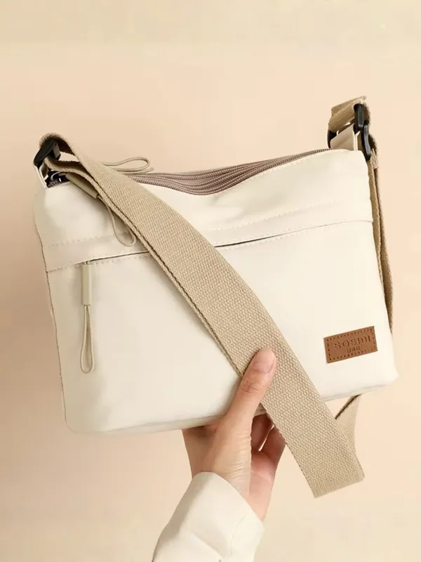 Beige_Lightweight_Nylon_Crossbody_Bag_with_Multi-Pocket_Design