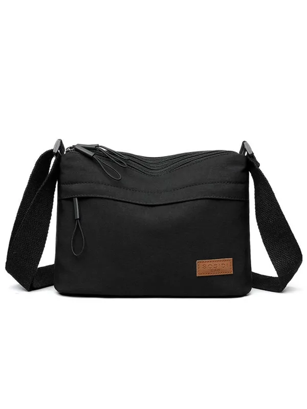 Black_Lightweight_Nylon_Crossbody_Bag_with_Multi-Pocket_Design