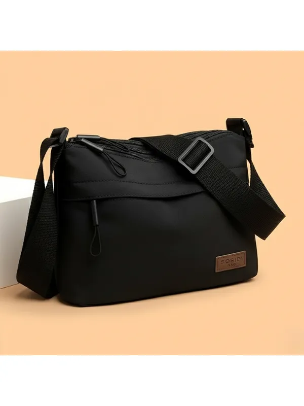 Black_Lightweight_Nylon_Crossbody_Bag_with_Multi-Pocket_Design