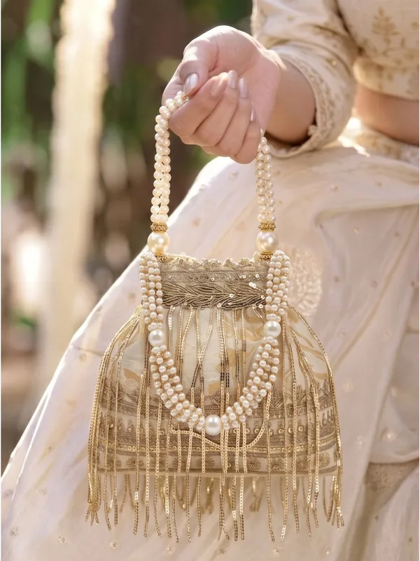 Elegant_Gold_Embroidered_Potli_Bag_with_Fringes