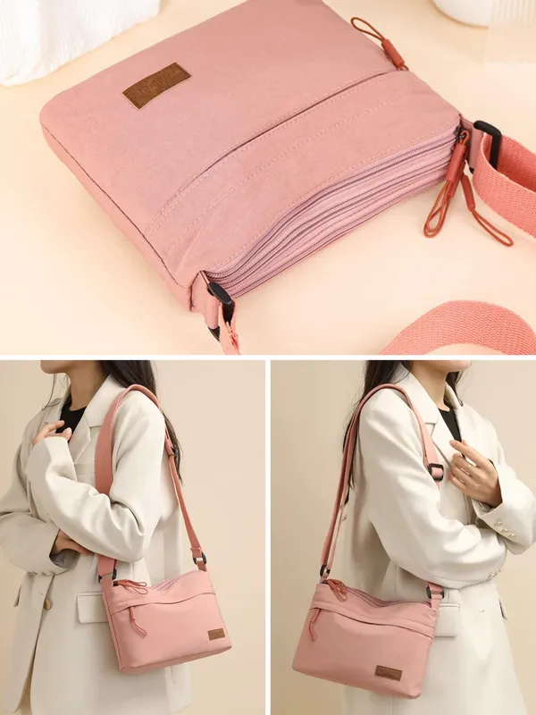 Pink_Lightweight_Nylon_Crossbody_Bag_with_Multi-Pocket_Design