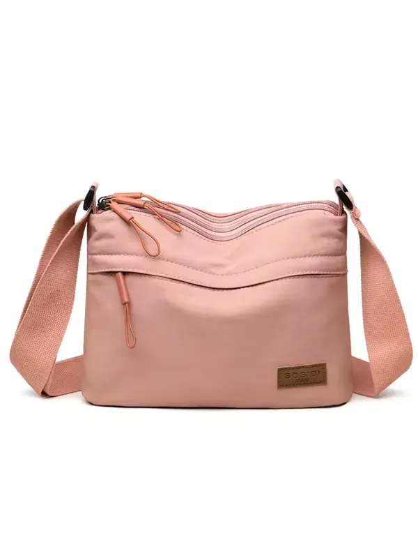 Pink_Lightweight_Nylon_Crossbody_Bag_with_Multi-Pocket_Design