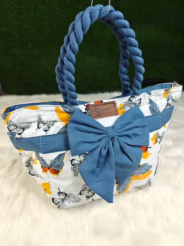 Multicolor_Fabric_&_Metal_Bow_Lunch_Storage_Bag_(10_Litres)