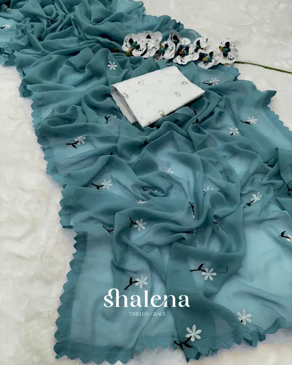 Blue_Georgette_Saree_with_Embroidery_and_Sequence_Work_Blouse_Piece