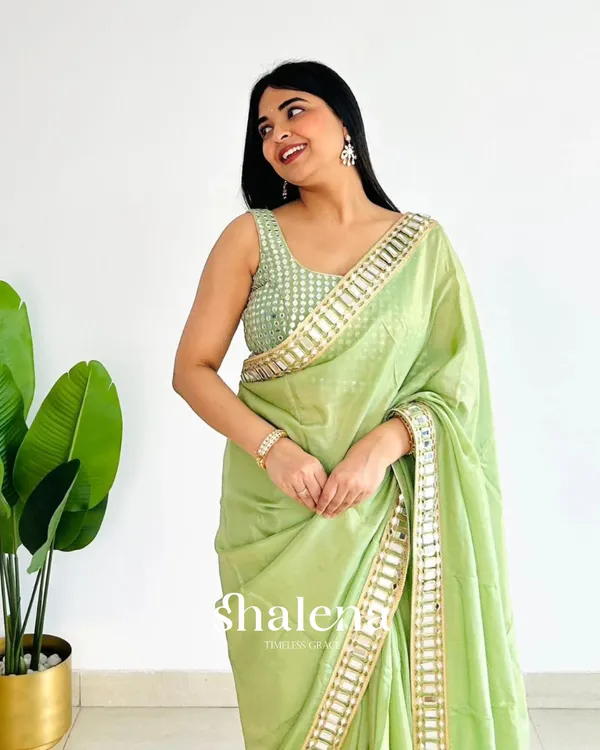 Dazzling_Pista_Satin_Silk_Mirror_Work_Saree_With_Splendorous_Blouse_Piece