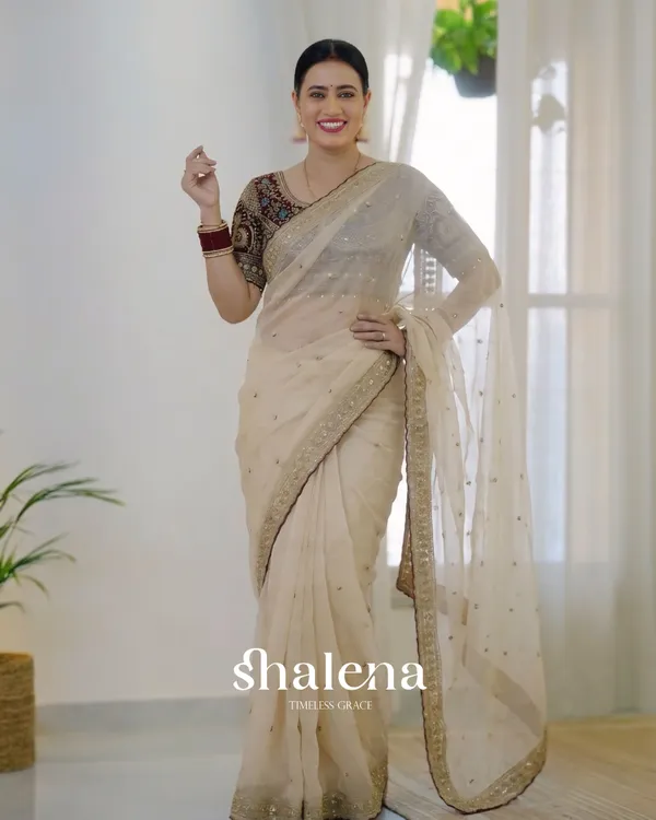 Prominent_Beige_Rangoli_Silk_Sequence_Embroidery_Work_Saree_With_Stitched_Blouse
