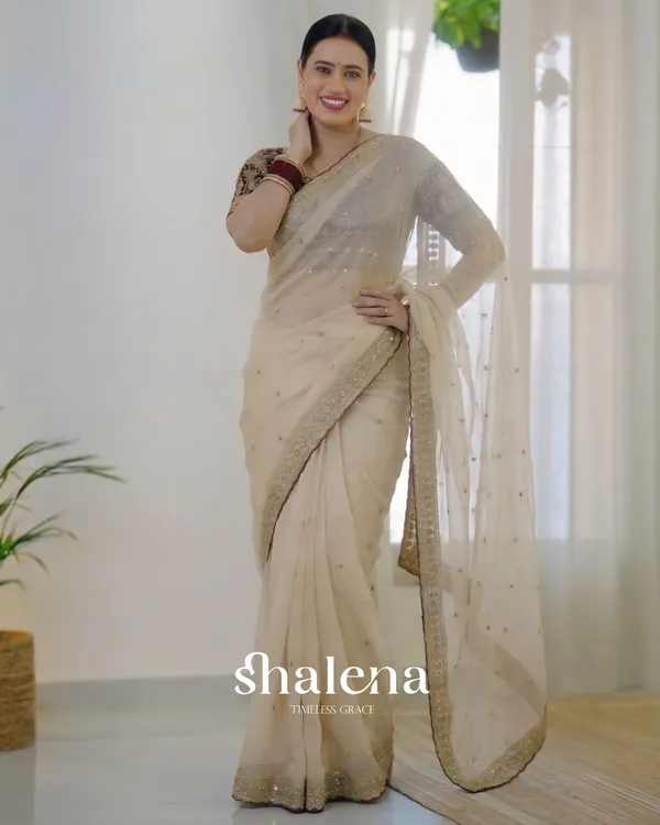 Prominent_Beige_Rangoli_Silk_Sequence_Embroidery_Work_Saree_With_Stitched_Blouse