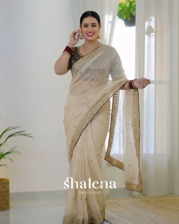 Prominent_Beige_Rangoli_Silk_Sequence_Embroidery_Work_Saree_With_Stitched_Blouse