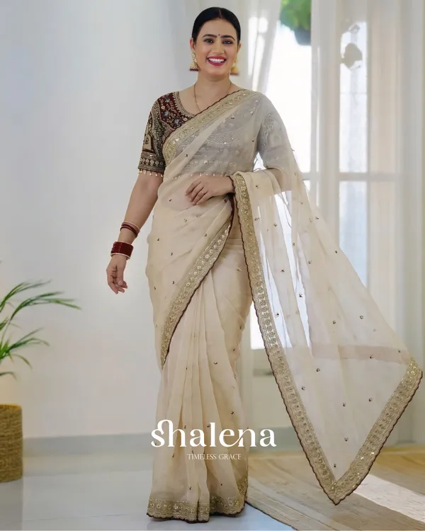Prominent_Beige_Rangoli_Silk_Sequence_Embroidery_Work_Saree_With_Stitched_Blouse