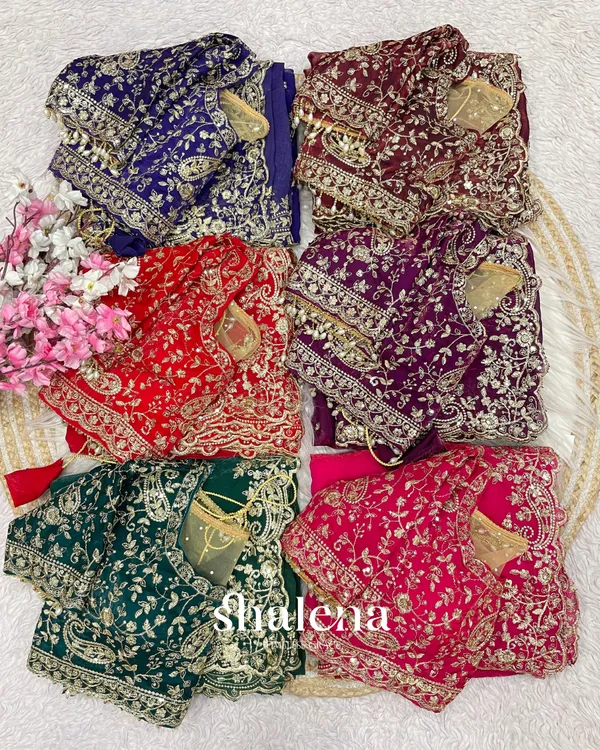 Elegant_Wine_Embroidery_Work_Fancy_Silk_Saree_With_Comely_Full_Stitched_Blouse