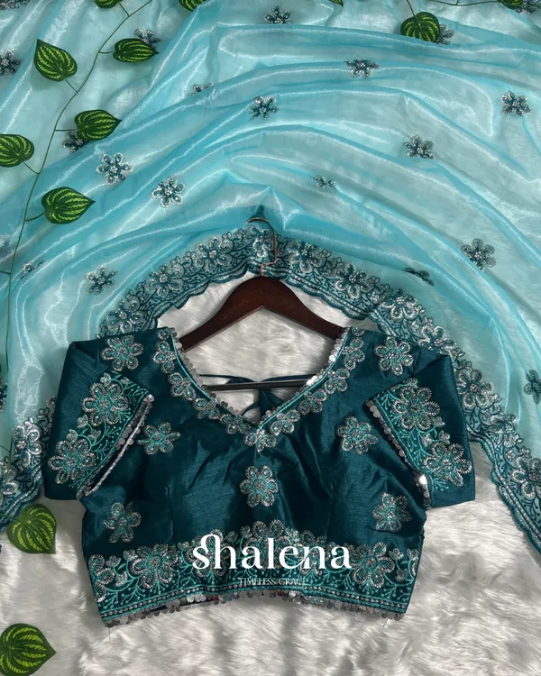 Confounding_Sky_Organza_Silk_Saree_With_Lissome_Full_Stitched_Blouse