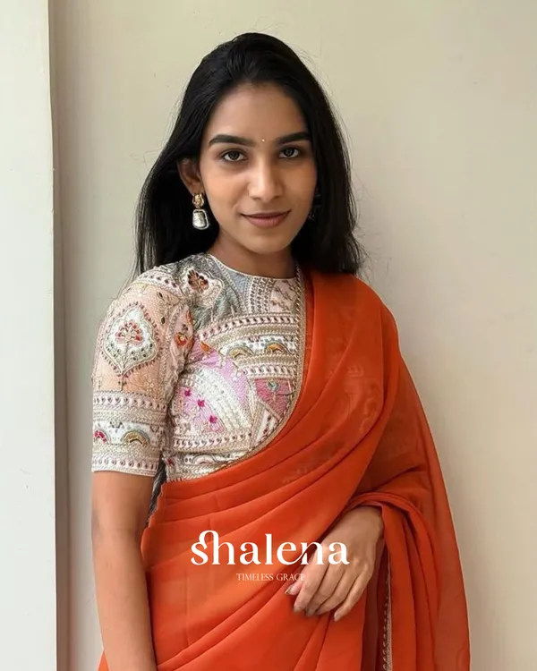 Sizzling_Orange_Georgette_Silk_Saree_With_Embroidery_Work_Blouse_Piece