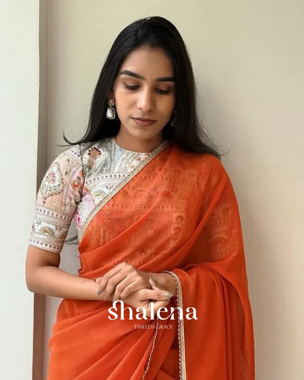 Sizzling_Orange_Georgette_Silk_Saree_With_Embroidery_Work_Blouse_Piece