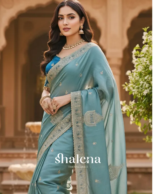 Enigmatic_Sky_Embroidery_Work_Chiffon_Silk_Saree_With_Elaborate_Full_Stitched_Blouse