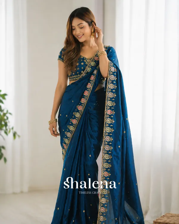 Lovely_Blue_Fendy_Silk_Sequence_Embroidery_Work_Saree_With_Stitched_Blouse