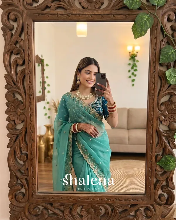 Extraordinary_Turquoise_Fendy_Silk_Sequence_Embroidery_Work_Saree_With_Stitched_Blouse
