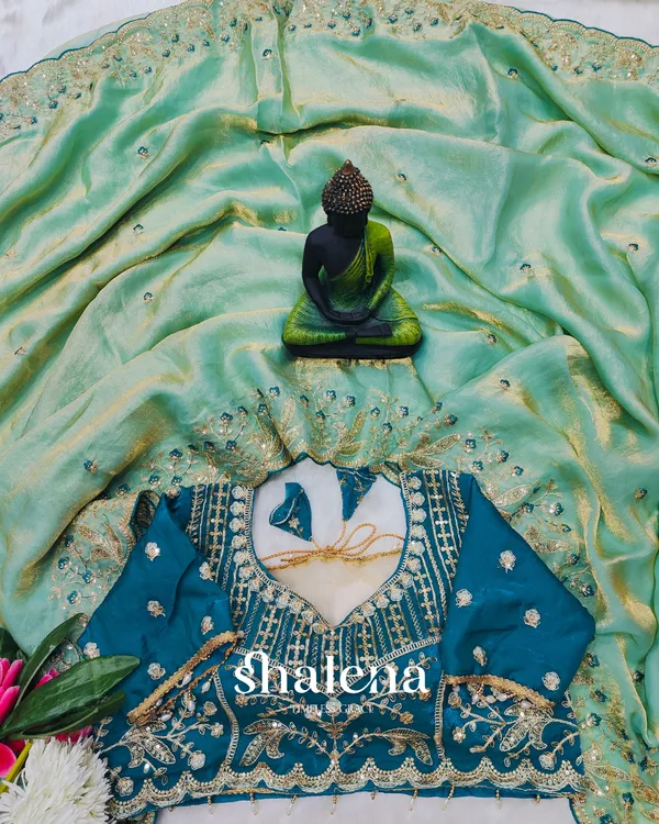 Extraordinary_Turquoise_Fendy_Silk_Sequence_Embroidery_Work_Saree_With_Stitched_Blouse
