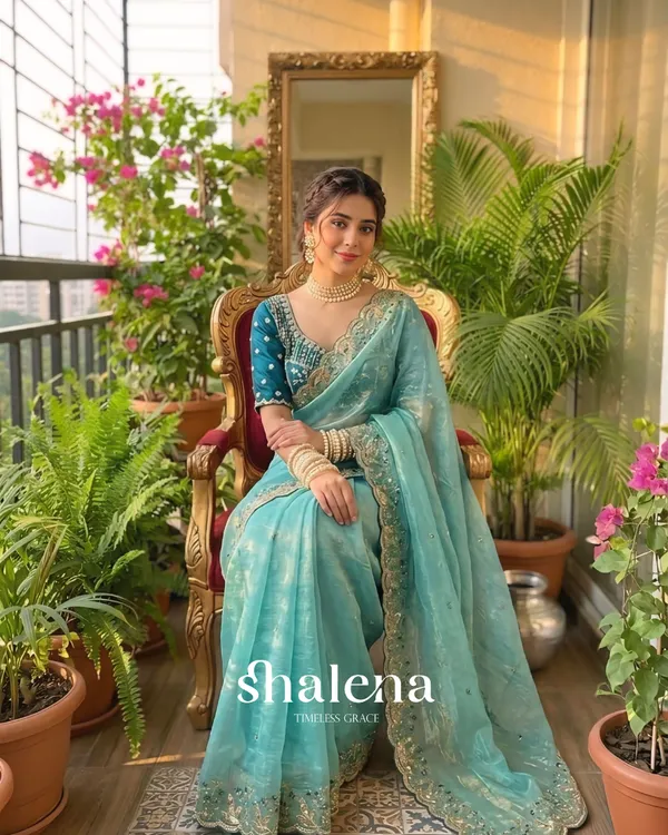 Extraordinary_Turquoise_Fendy_Silk_Sequence_Embroidery_Work_Saree_With_Stitched_Blouse