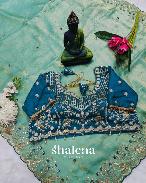 Extraordinary_Turquoise_Fendy_Silk_Sequence_Embroidery_Work_Saree_With_Stitched_Blouse