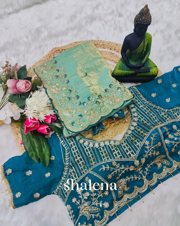 Extraordinary_Turquoise_Fendy_Silk_Sequence_Embroidery_Work_Saree_With_Stitched_Blouse