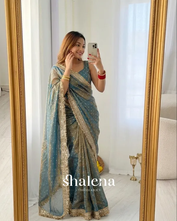 Lassitude_Sea_Green_Moss_Silk_Zari_Woven_Fancy_Lace_Border_Saree