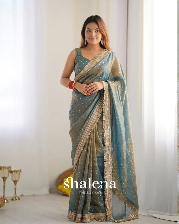 Lassitude_Sea_Green_Moss_Silk_Zari_Woven_Fancy_Lace_Border_Saree