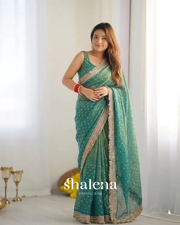 Lassitude_Sea_Green_Moss_Silk_Zari_Woven_Fancy_Lace_Border_Saree