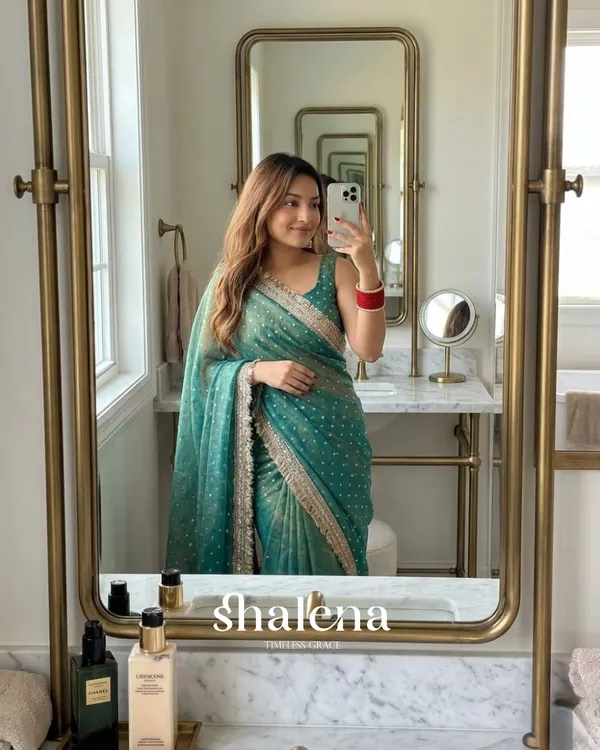 Lassitude_Sea_Green_Moss_Silk_Zari_Woven_Fancy_Lace_Border_Saree
