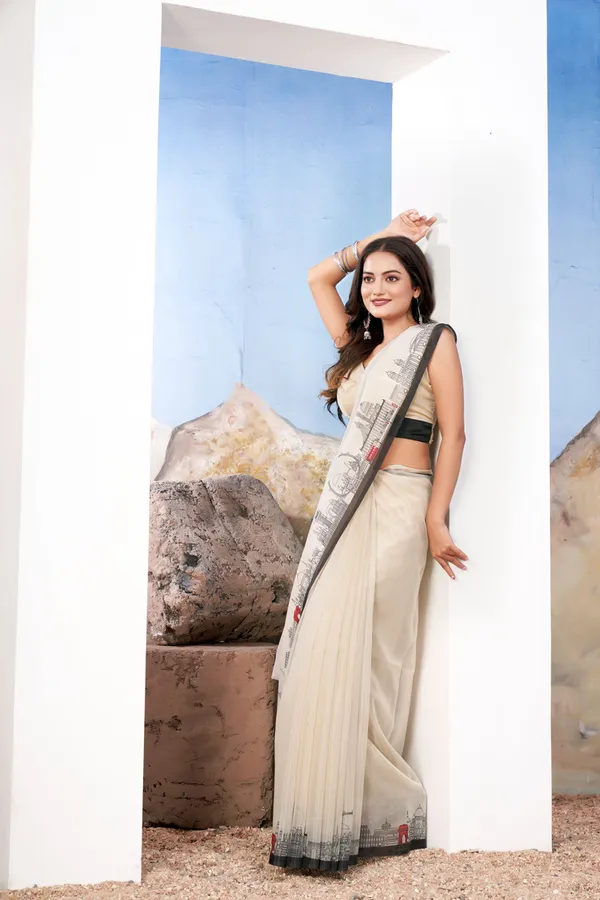 White_Creamy_Elegant_Creamy_Georgette_Saree_With_Monuments_Design