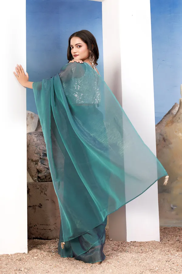 Teal_Green_Modern_Green_Silk_Satin_Saree_Paired_With_A_Shiny_Silver_Blouse