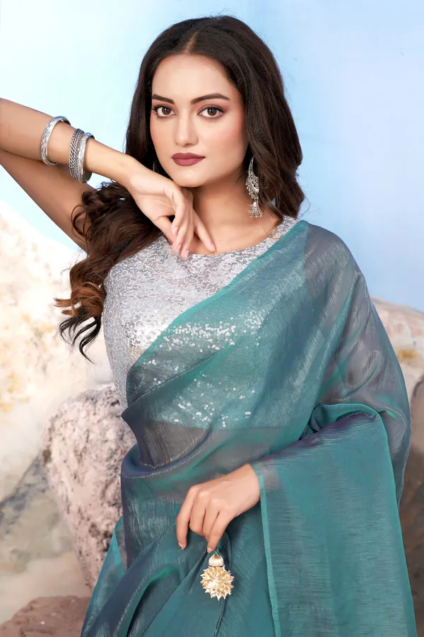 Teal_Green_Modern_Green_Silk_Satin_Saree_Paired_With_A_Shiny_Silver_Blouse