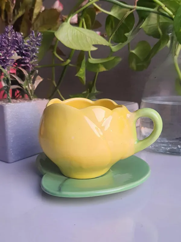 Petite_Ceramic_Cup_and_Saurcer_Set:_Artisanal_Charm,_Yellow_Cup_&_Green_Saucer