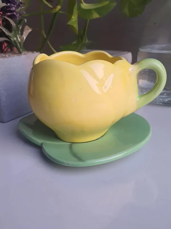 Petite_Ceramic_Cup_and_Saurcer_Set:_Artisanal_Charm,_Yellow_Cup_&_Green_Saucer
