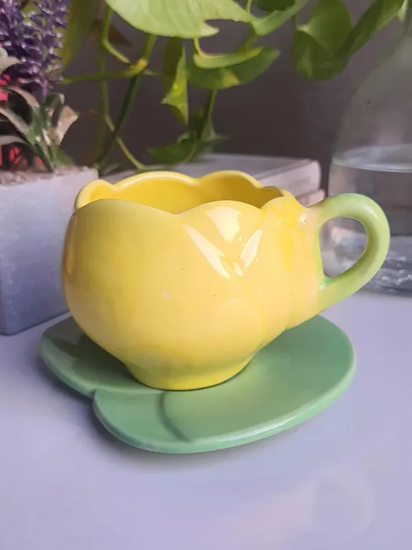 Petite_Ceramic_Cup_and_Saurcer_Set:_Artisanal_Charm,_Yellow_Cup_&_Green_Saucer