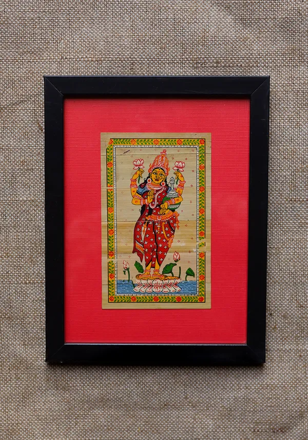 Wall_hanging_with_new_framed_design_Talpatra_(Palm_leaf)_painting_of_Maa_Laxmi