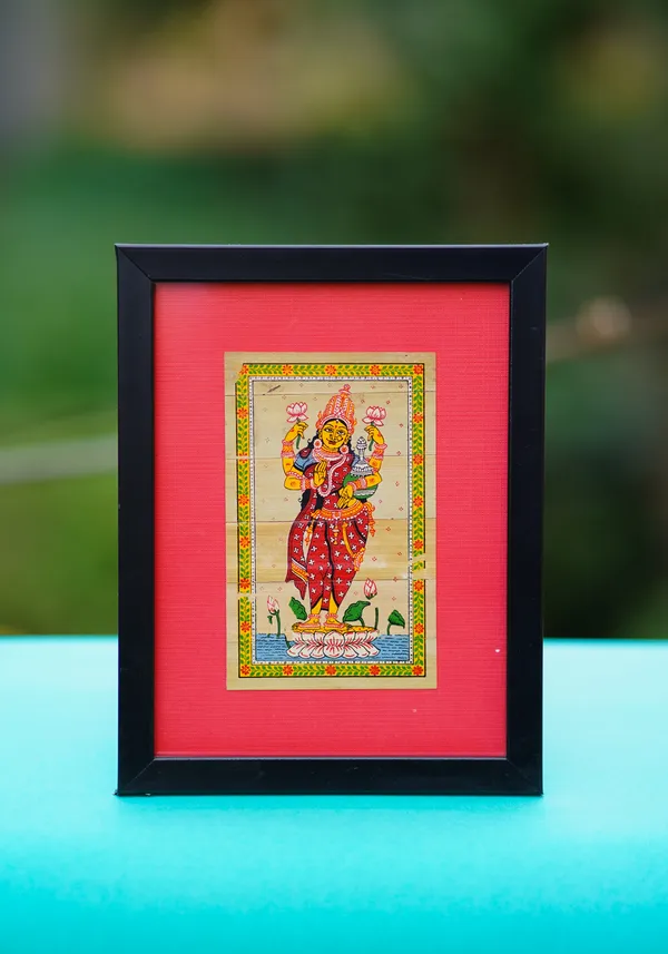 Wall_hanging_with_new_framed_design_Talpatra_(Palm_leaf)_painting_of_Maa_Laxmi