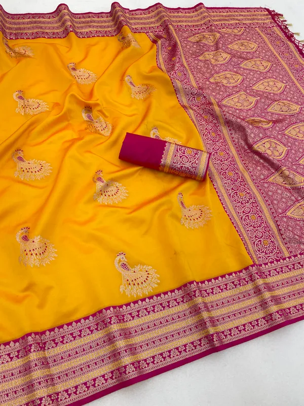 Yellow_Banarasi_Silk_Saree_With_Pink_Contrast_Border_And_Peacock_Motifs