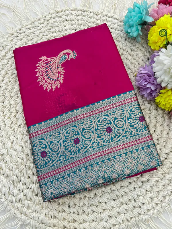 Pink_Silk_Saree_With_Golden_Peacock_Motifs_And_Teal_Border