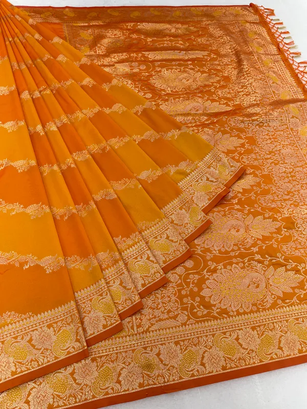 Orange_Silk_Saree_With_Golden_Zari_Border_And_Peacock_Motifs
