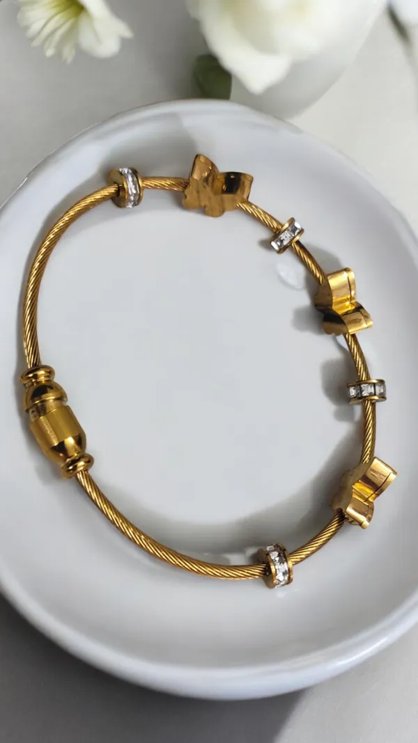 Gold_Cable_Bracelet_with_Butterfly_Charms_and_Crystal_Accents