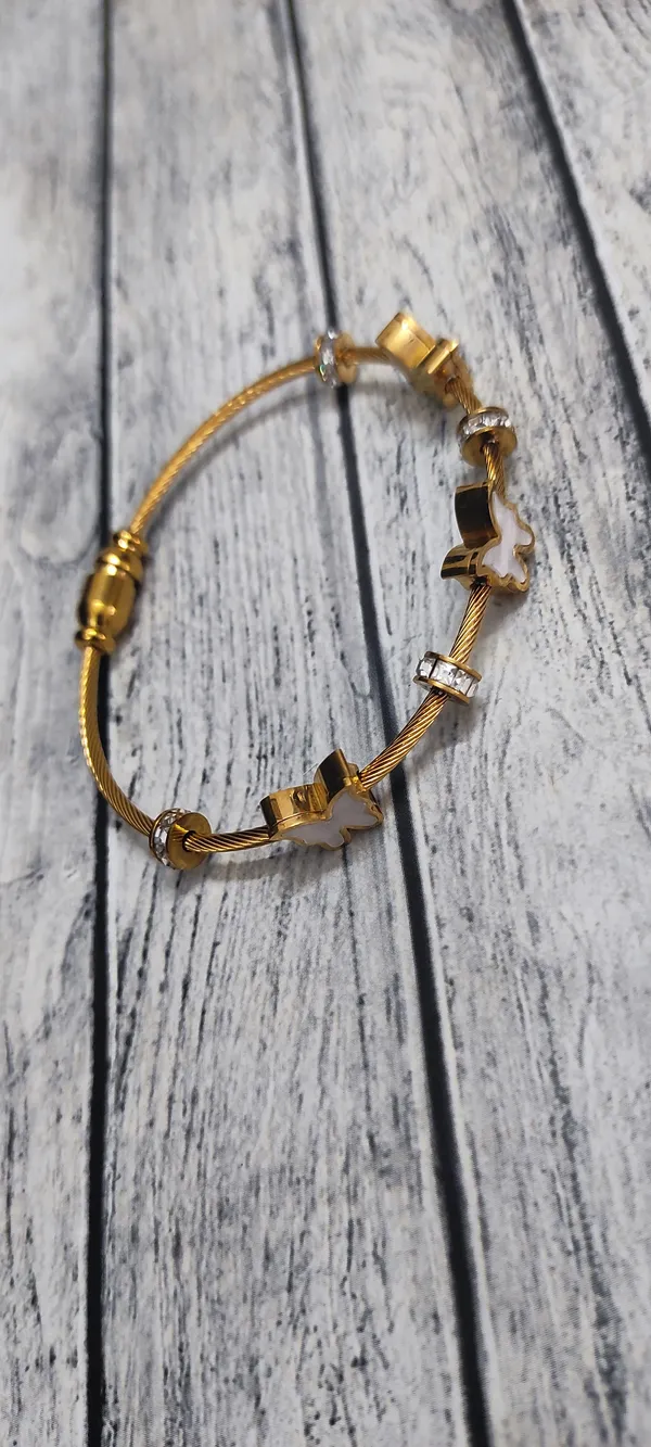 Gold_Cable_Bracelet_with_Butterfly_Charms_and_Crystal_Accents