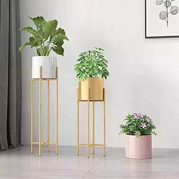 Gold_metal_plant_stand_with_a_mid-century_modern_design,_suitable_for_large_plant_pots,_in_white.