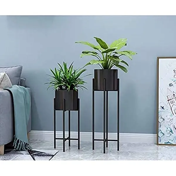 Gold_metal_plant_stand_with_a_mid-century_modern_design,_suitable_for_large_plant_pots,_in_white.