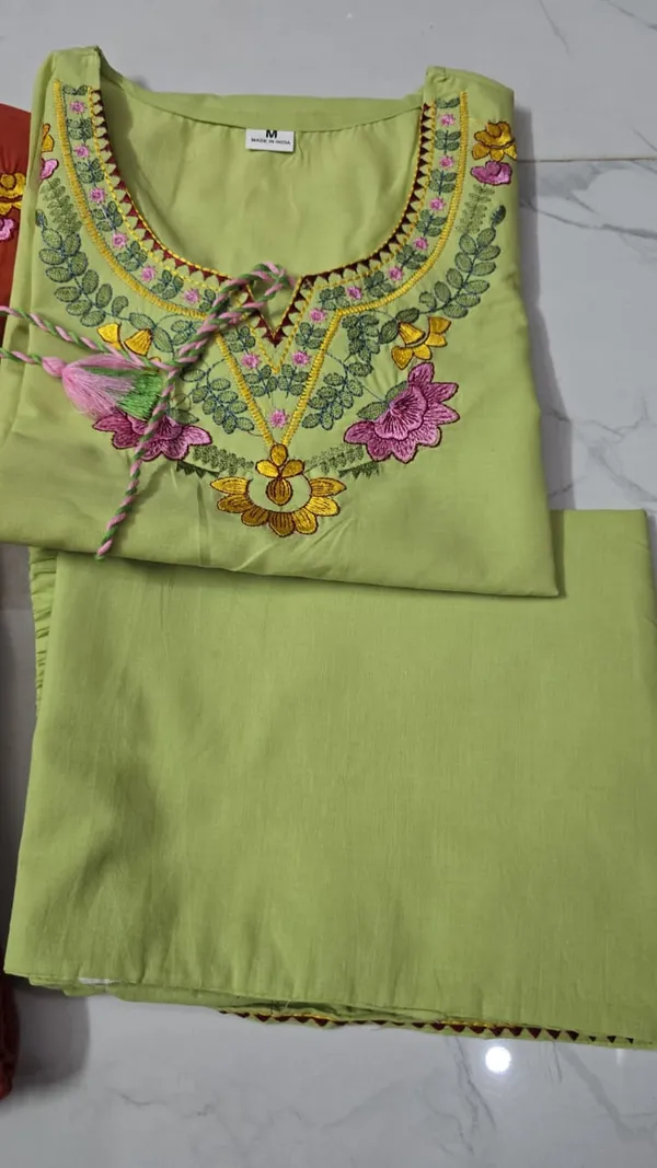 Stylish_embroidered_co-ord_set_with_tassel_detailing_and_coordinated_kurti_and_pant