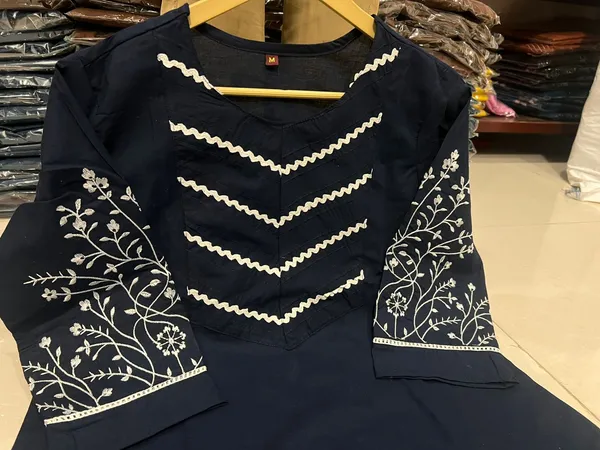Stylish_Trending_Cotton_Embroidered_Straight_Kurta_Pant_Set_with_Pintuck_Detailing