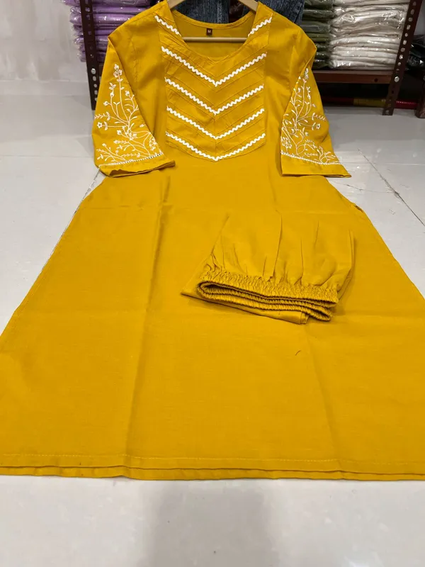 Stylish_Trending_Cotton_Embroidered_Straight_Kurta_Pant_Set_with_Pintuck_Detailing