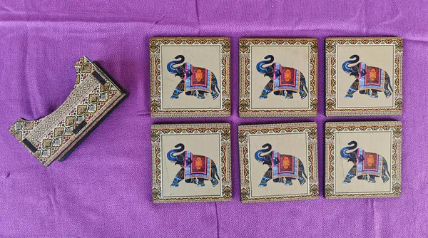 Rastogi_Handicrafts_Coaster_Set_of_6_Colorful_India_Theme_Design_Wooden_Coasters_to_Serve_Tea_Cups,_Coffee_Mugs_and_Glasses_(Blue_Ele_Coaster_Set)