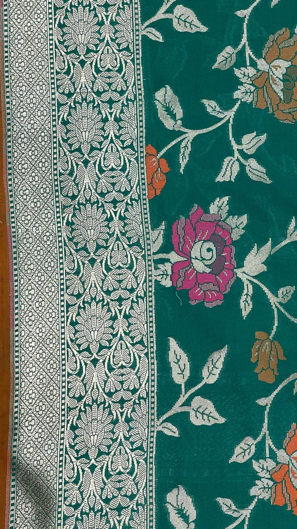 Humairah_Presents_Dark_Green_Katan_Silk_Golden_Zari_Floral_Tilfi_Mina_Jaal_Banarasi_Dual_Shade_Zari_Border_and_Floral_Jaal_Pallu_with_Green_Blouse