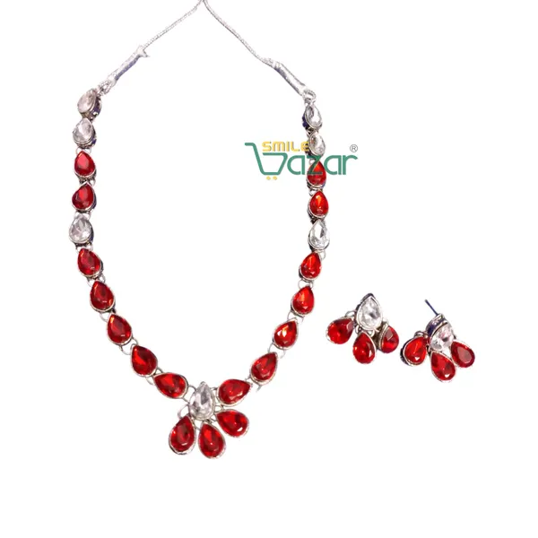 Elegant_Kundan_Necklace_Set_Adorned_With_Red_And_Clear_Kundan
